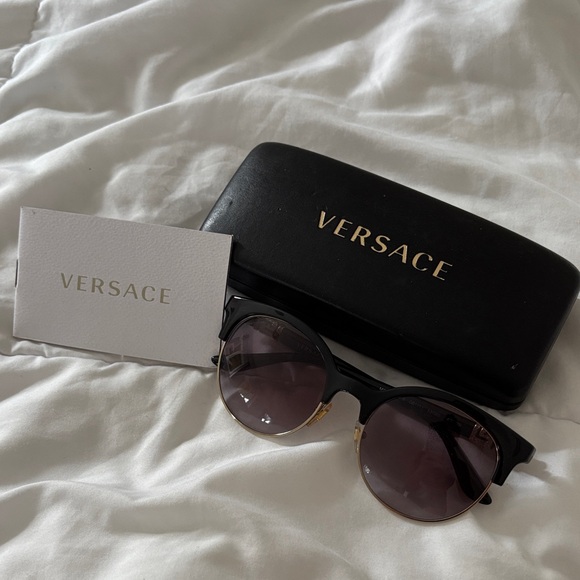 Versace Women\'s Sunglasses in Black and Gold